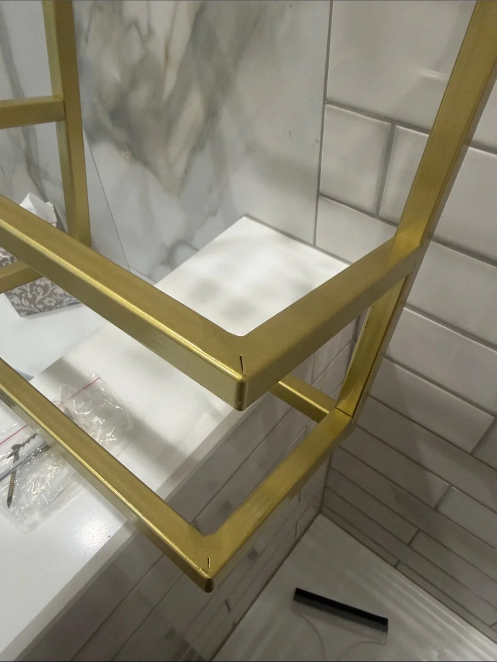 Gold Wall-Mounted Towel Rack with Green and Beige Towels - Modern Bath Storage